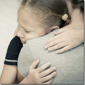 Girl-Hugging-Mom-Sad.jpg