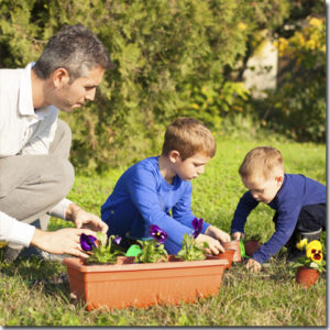Kids-Planting-With-Dad.jpg