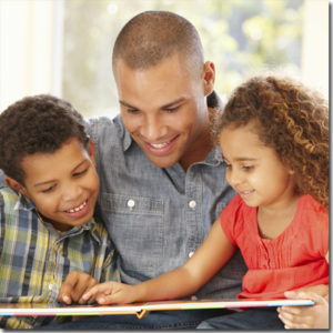 family reading boy girl dad